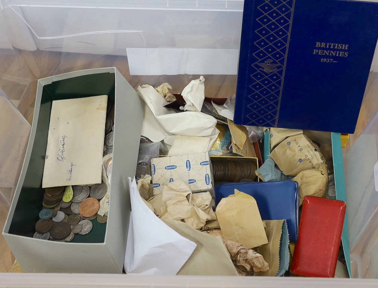 A box of UK and World coins including George V and George VI florins, shillings etc